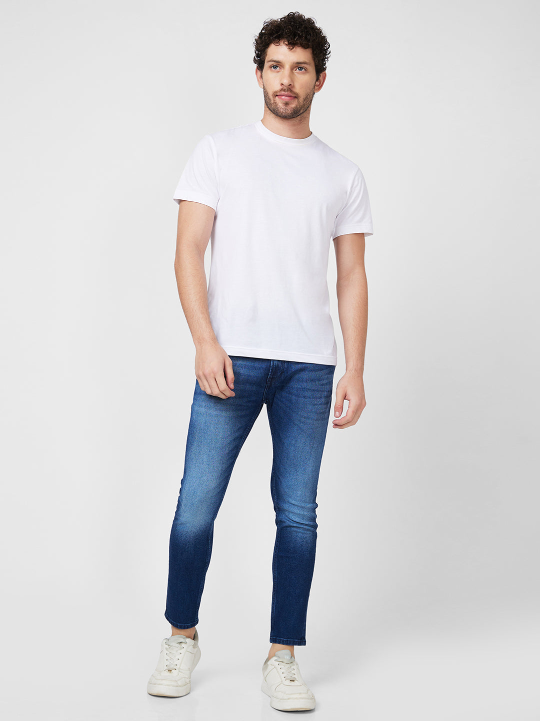 Spykar Mid Rise Slim Fit Tapered Length Blue Jeans For Men