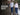 Man and woman wearing Spykar denim outfits on a rain-wet university campus | 