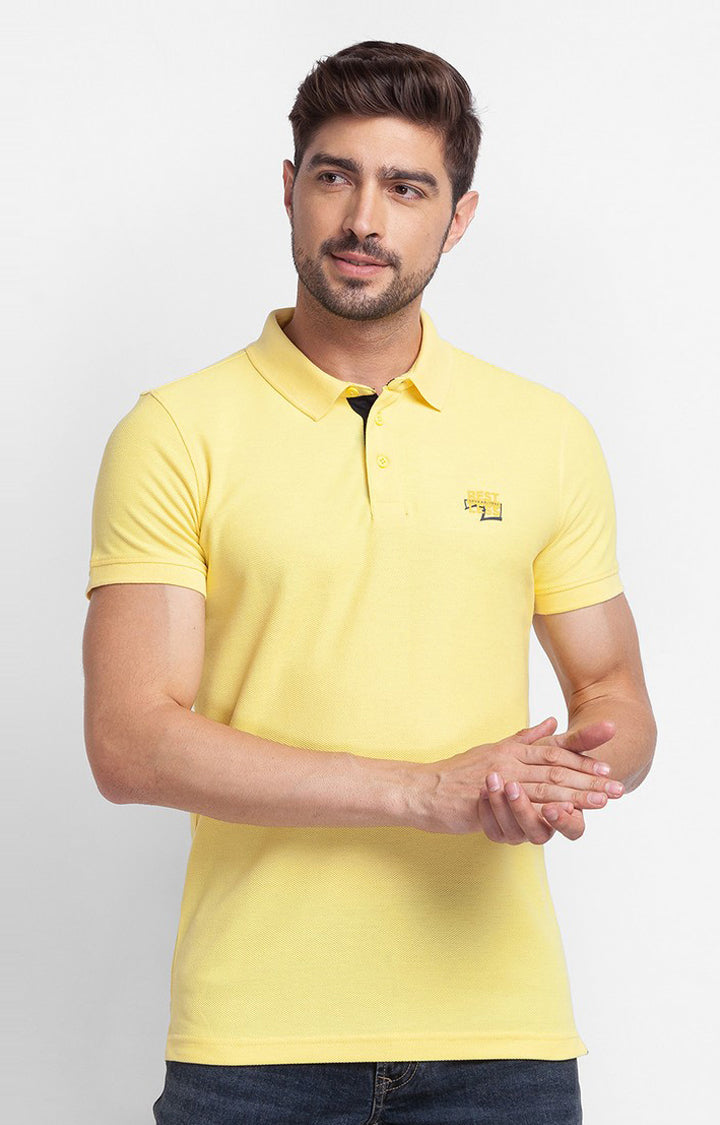 Spykar Yellow Cotton Half Sleeve Plain Casual Polo T-Shirt For Men