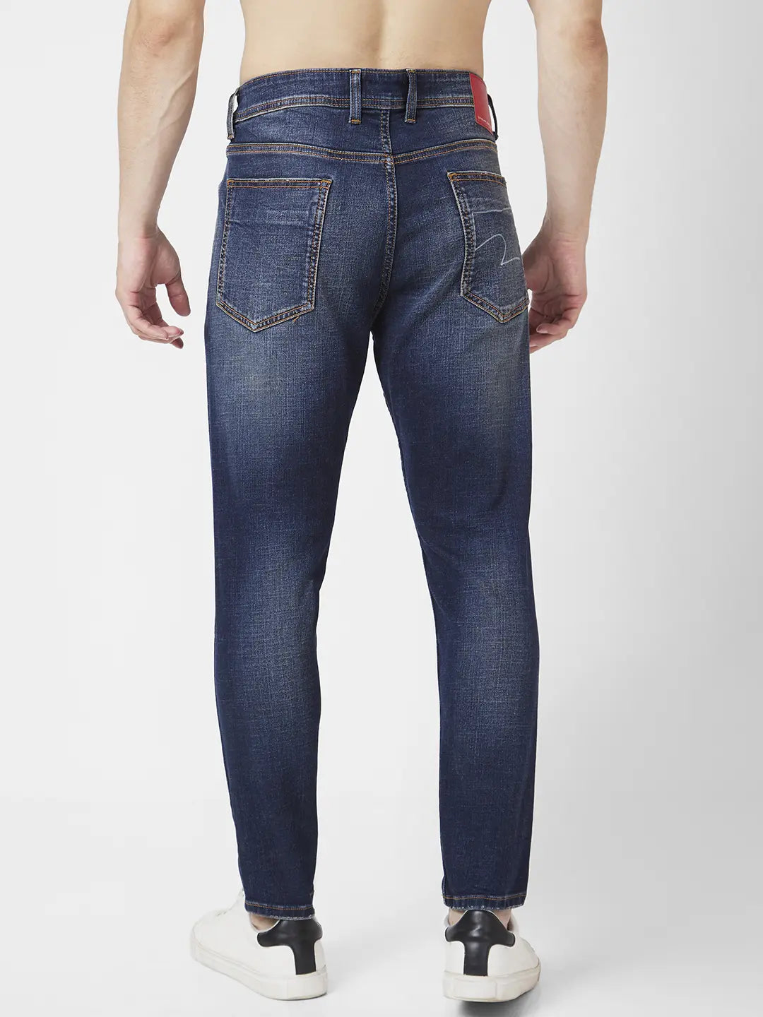 Spykar Men Dark Blue Cotton Slim Fit Tapered Length Knee Slash Mid Rise Jeans (Kano)