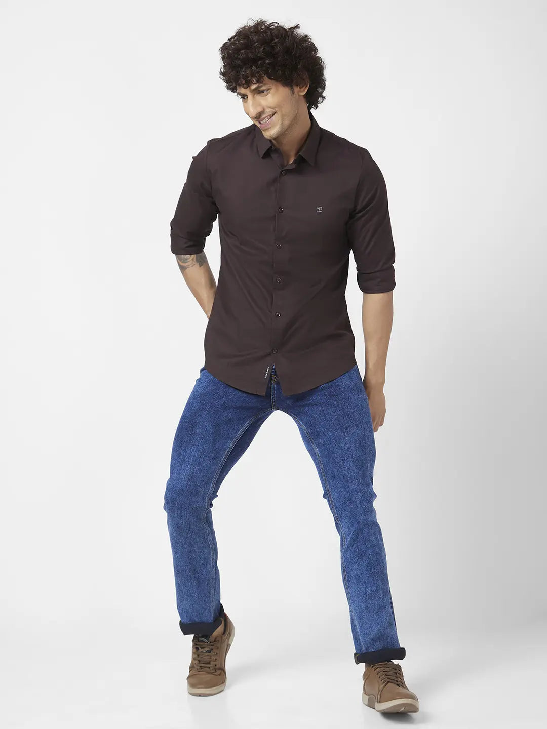 Brown shirt and black jeans sales