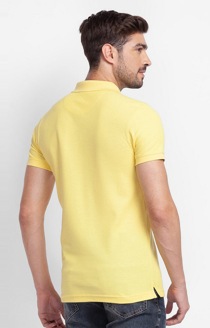 Spykar Yellow Cotton Half Sleeve Plain Casual Polo T-Shirt For Men