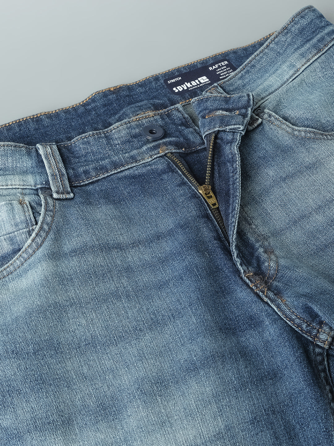 Spykar Limited Edition Mid Blue Bootcut Fit Regular Length Low rise Knee Slit Premium Stretchable Denim Jeans For Men (Rafter)