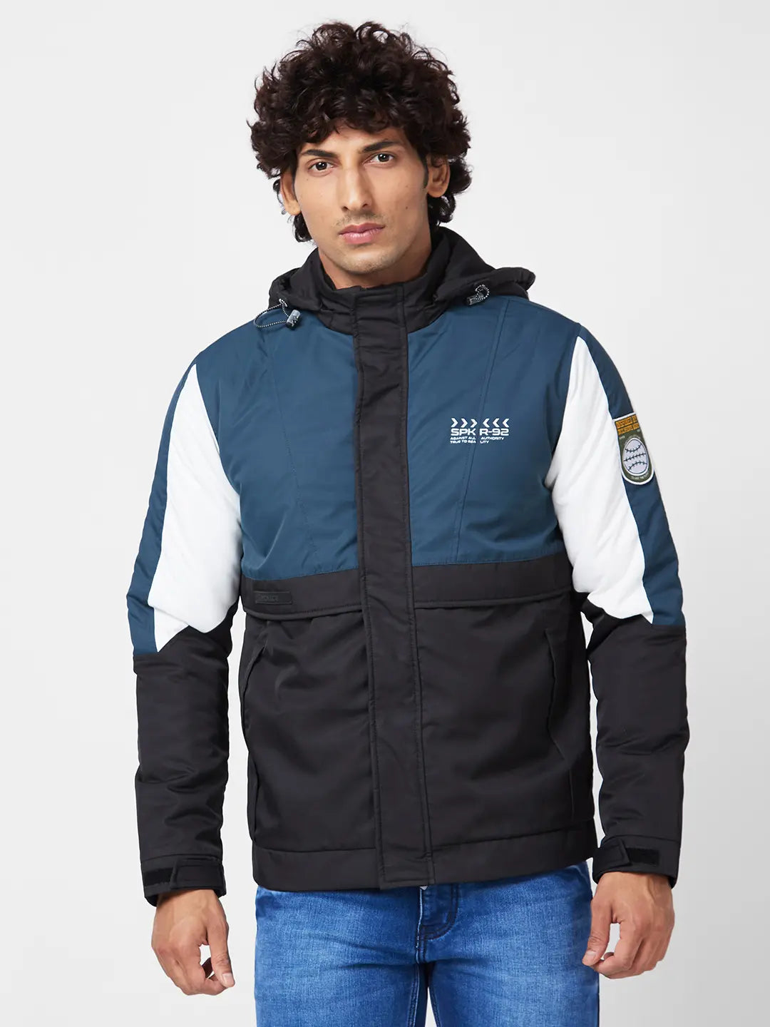 MEN'S SHELL COLOR BLOCKED JACKET WITH SLEEVE BADGE DETAIL.