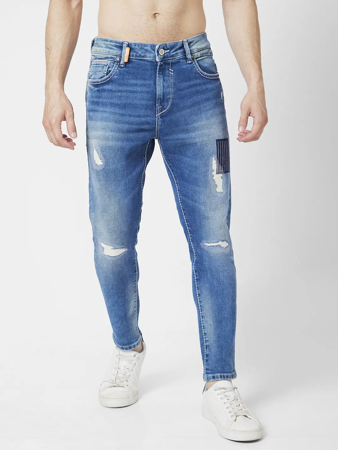Spykar Men Vintage Blue Cotton Slim Fit Tapered Length Mild Distressed Mid Rise Jeans (Kano)
