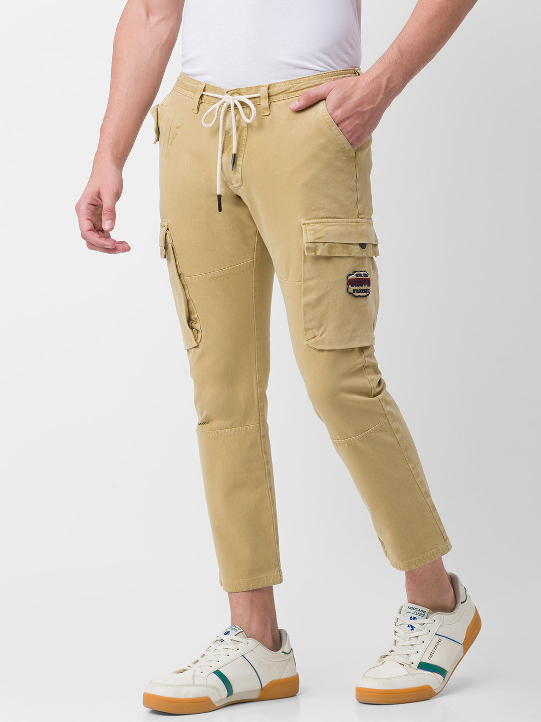 Buy OnlineSpykar Men Light Khaki Cotton Slim Fit Ankle Length Plain  Trousers