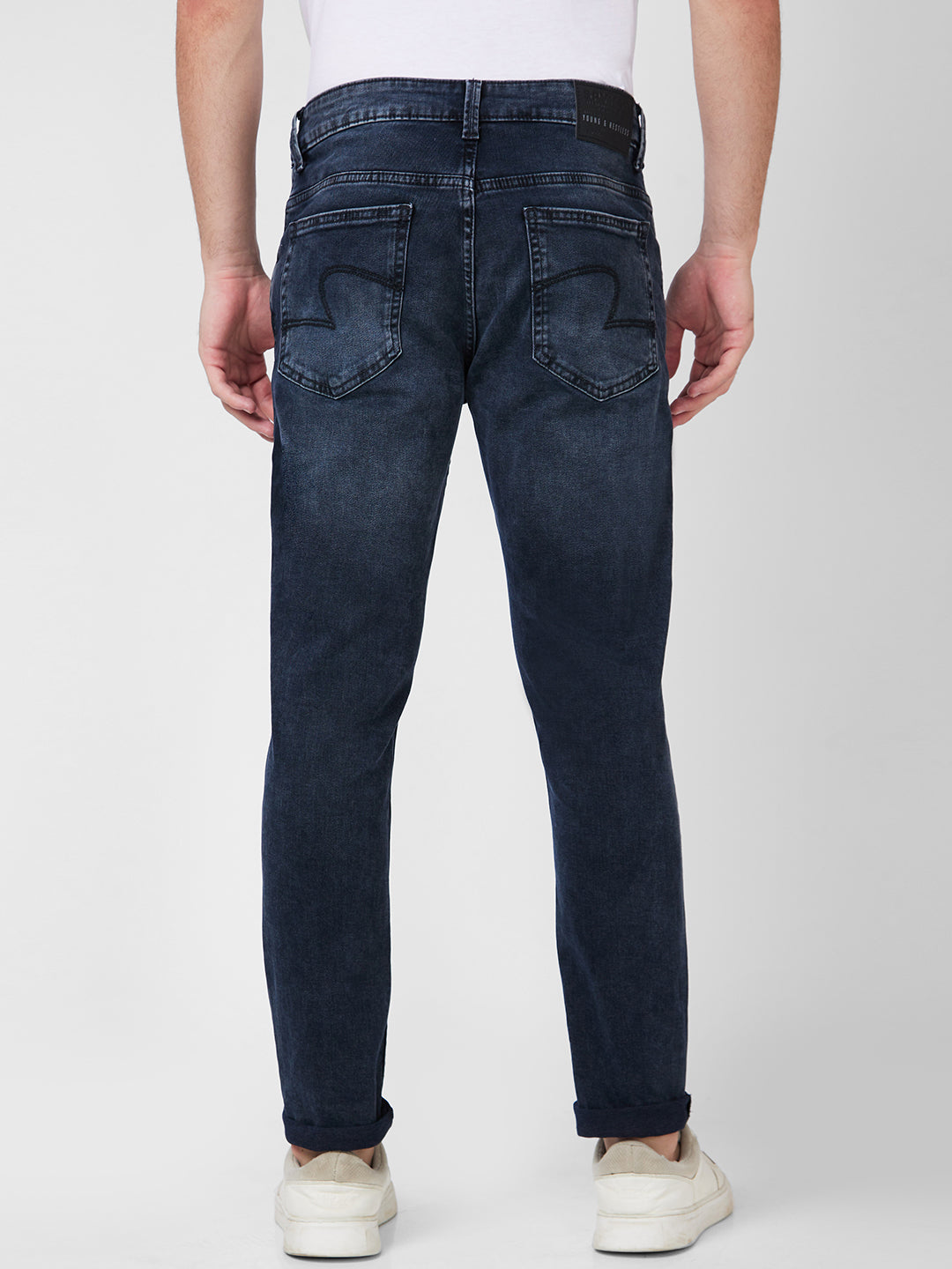 Spykar Mid Rise Slim Fit Tapered Length Black Indigo Jeans For Men