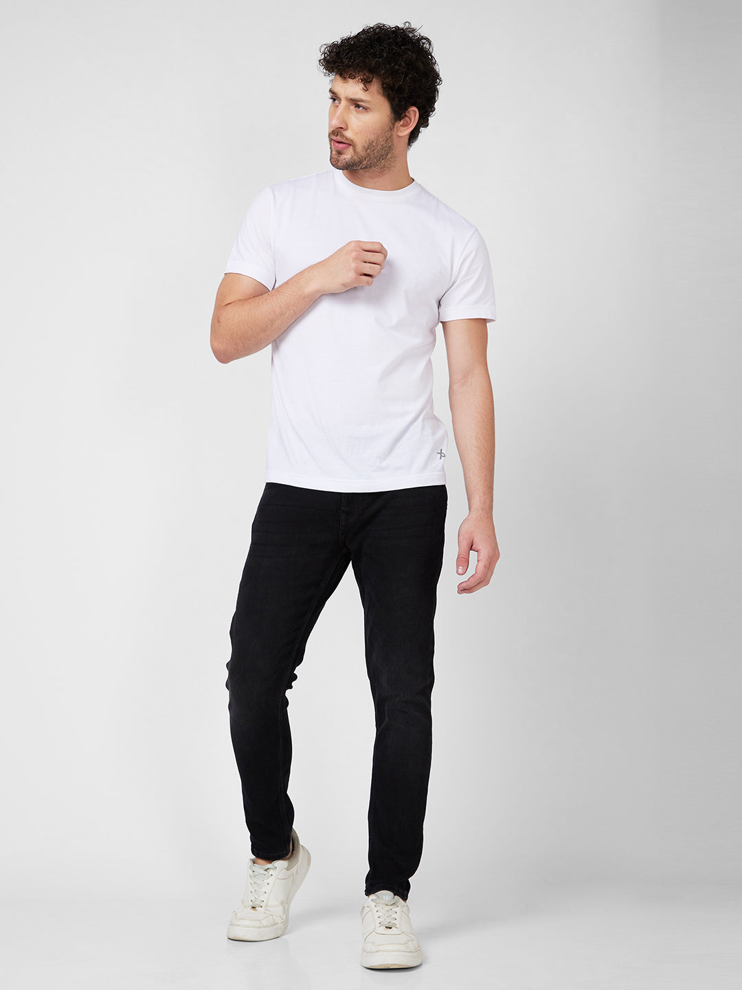 Spykar Mid Rise Slim Fit Tapered Length Black Jeans For Men