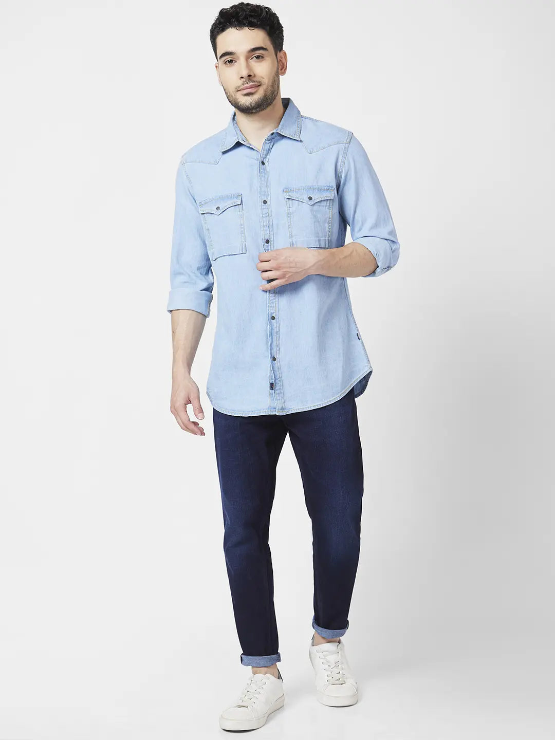 Light blue denim top shirt with dark jeans