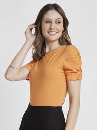 Spykar Women Apricot Crush Blended Slim Fit Half Sleeve Boat Neck Plain Crop Tshirt