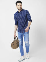 Spykar Men Mid Blue Cotton Slim Fit Tapered Length Mild Distressed Mid Rise Jeans (Kano)