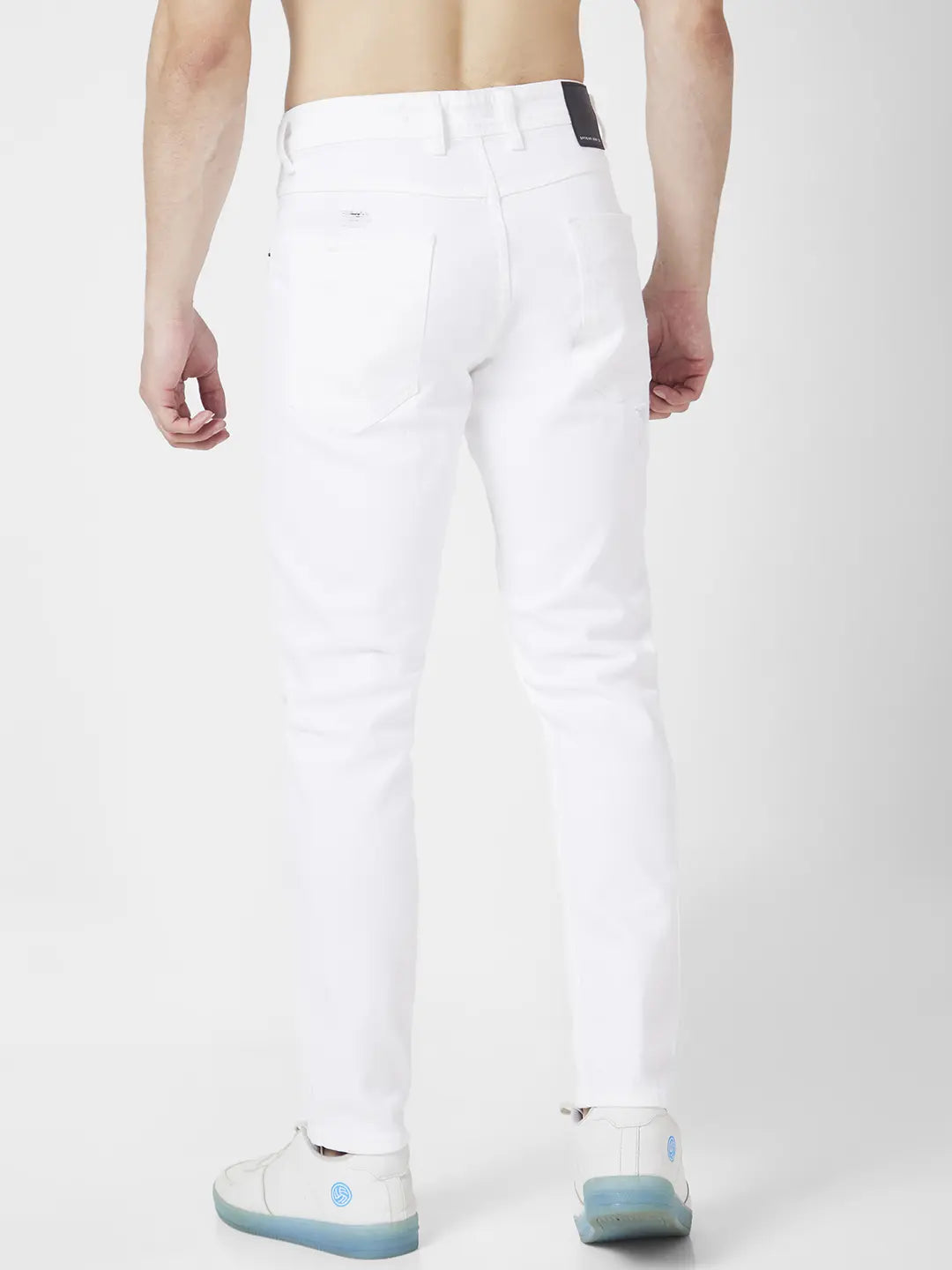 Spykar Men White Cotton Slim Fit Tapered Length Knee Slash Mid Rise Jeans (Kano)