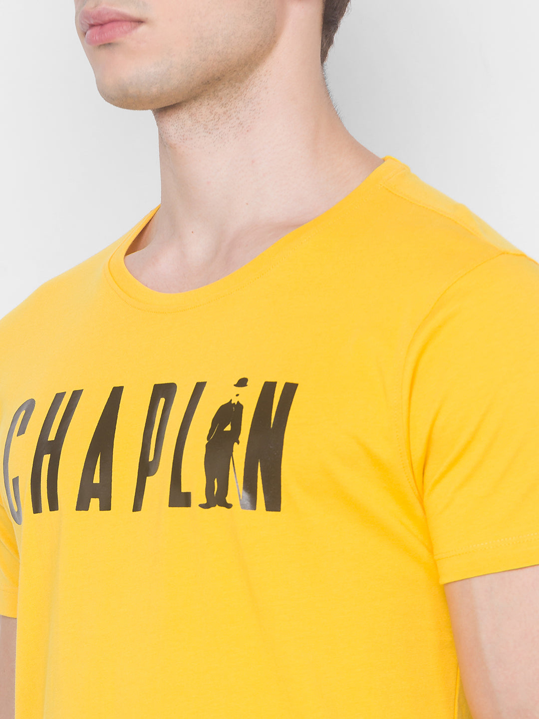 Charlie Chaplin Spykar Men Yellow Cotton Slim Fit Round Neck T-Shirt