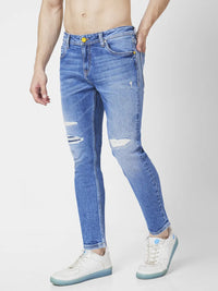 Spykar Men Mid Blue Cotton Slim Fit Tapered Length Mild Distressed Mid Rise Jeans (Kano)