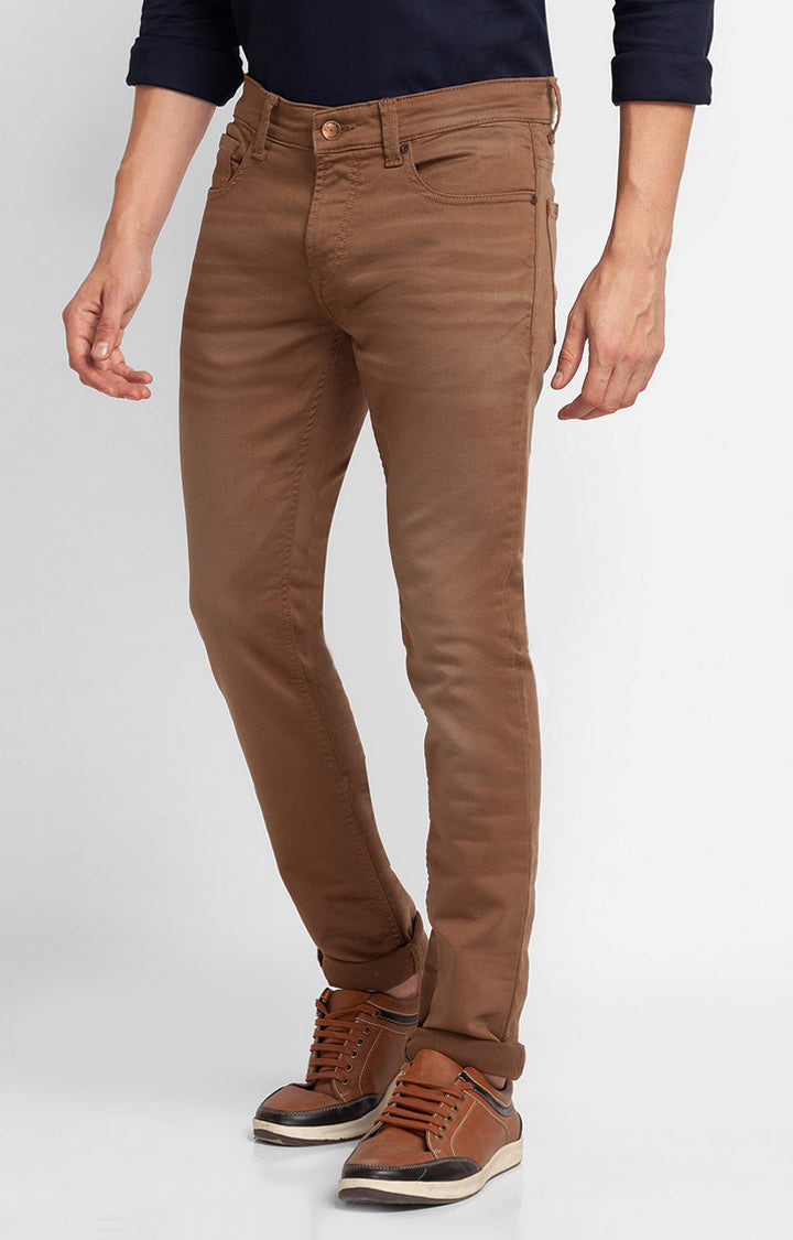 black turtleneck brown pants
