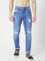Spykar Men Mid Blue Cotton Slim Fit Narrow Length Mild Distressed Low Rise Jeans (Skinny)