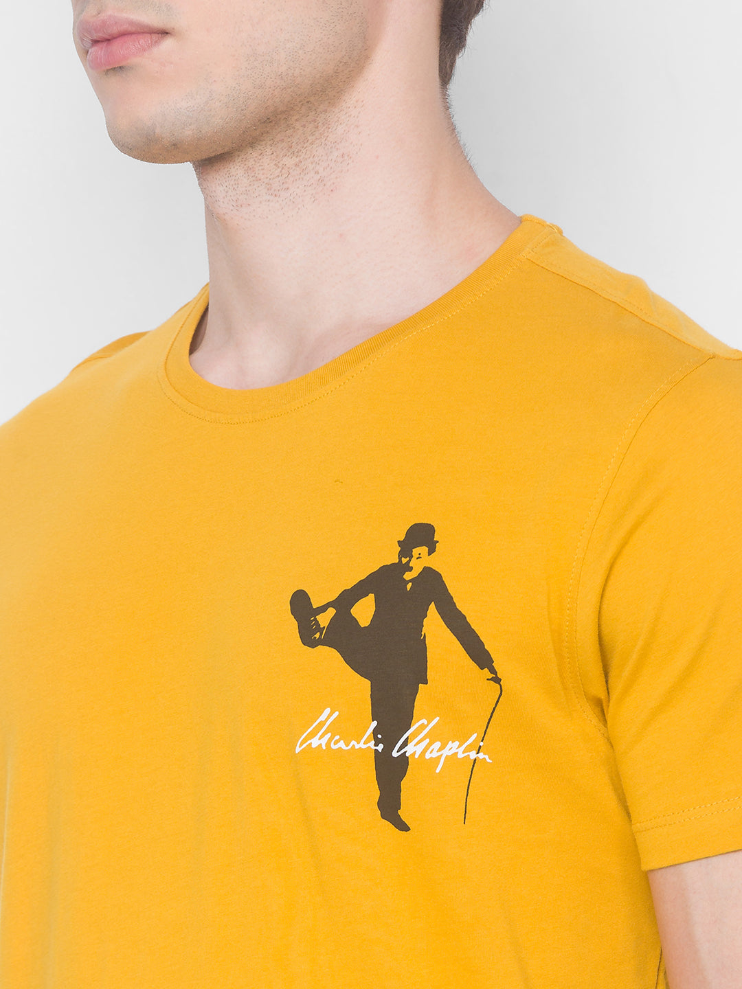 Charlie Chaplin Spykar Men Yellow Cotton Slim Fit Round Neck T-Shirt