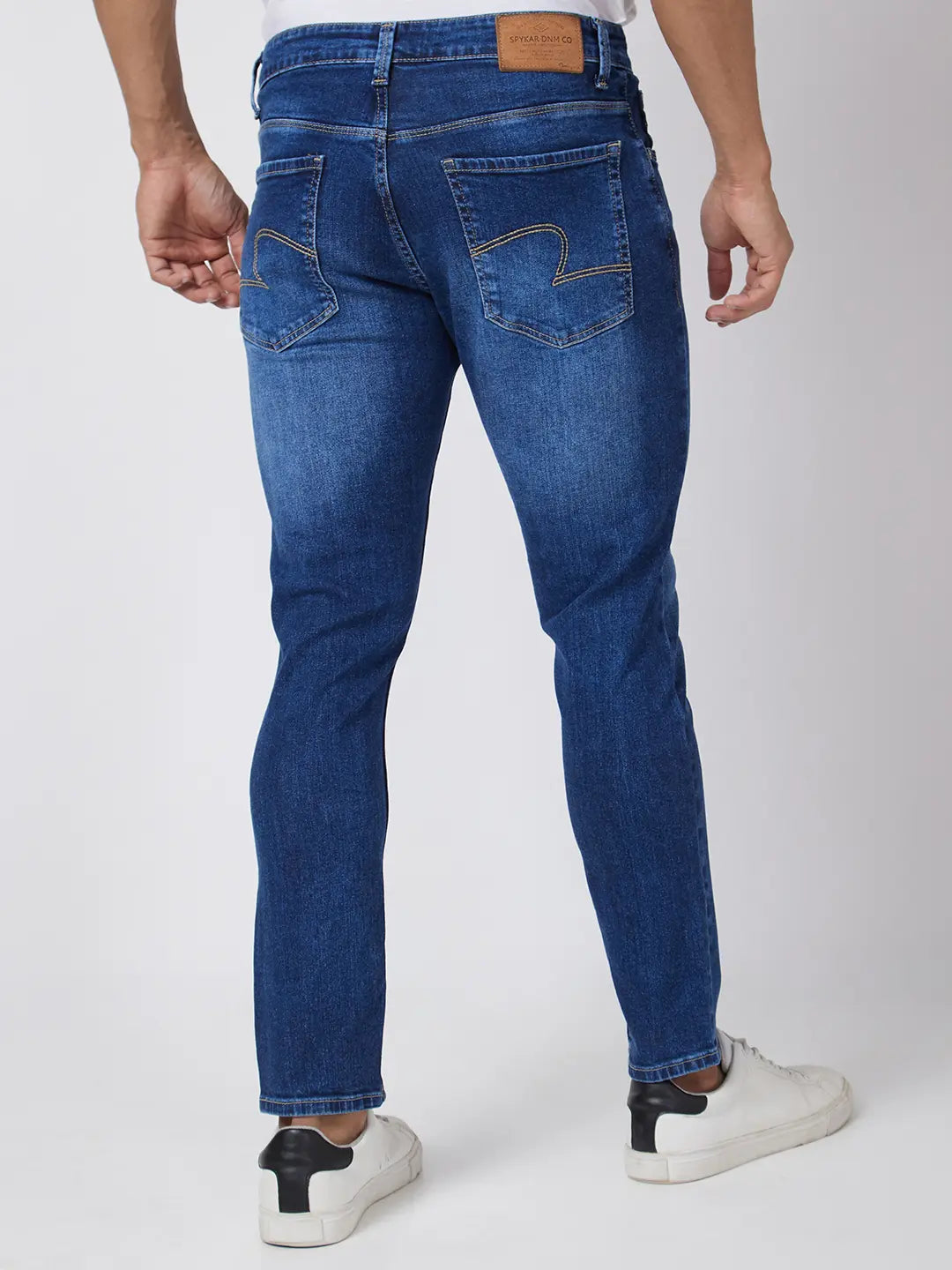 Spykar Men Mid Blue Cotton Stretch Slim Fit Tapered Length Clean Look Mid Rise Jeans (Kano)