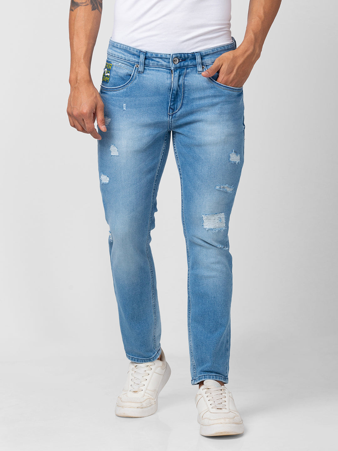Buy Men Light Blue Tapered Length Mild Ripped Mid Rise Jeans