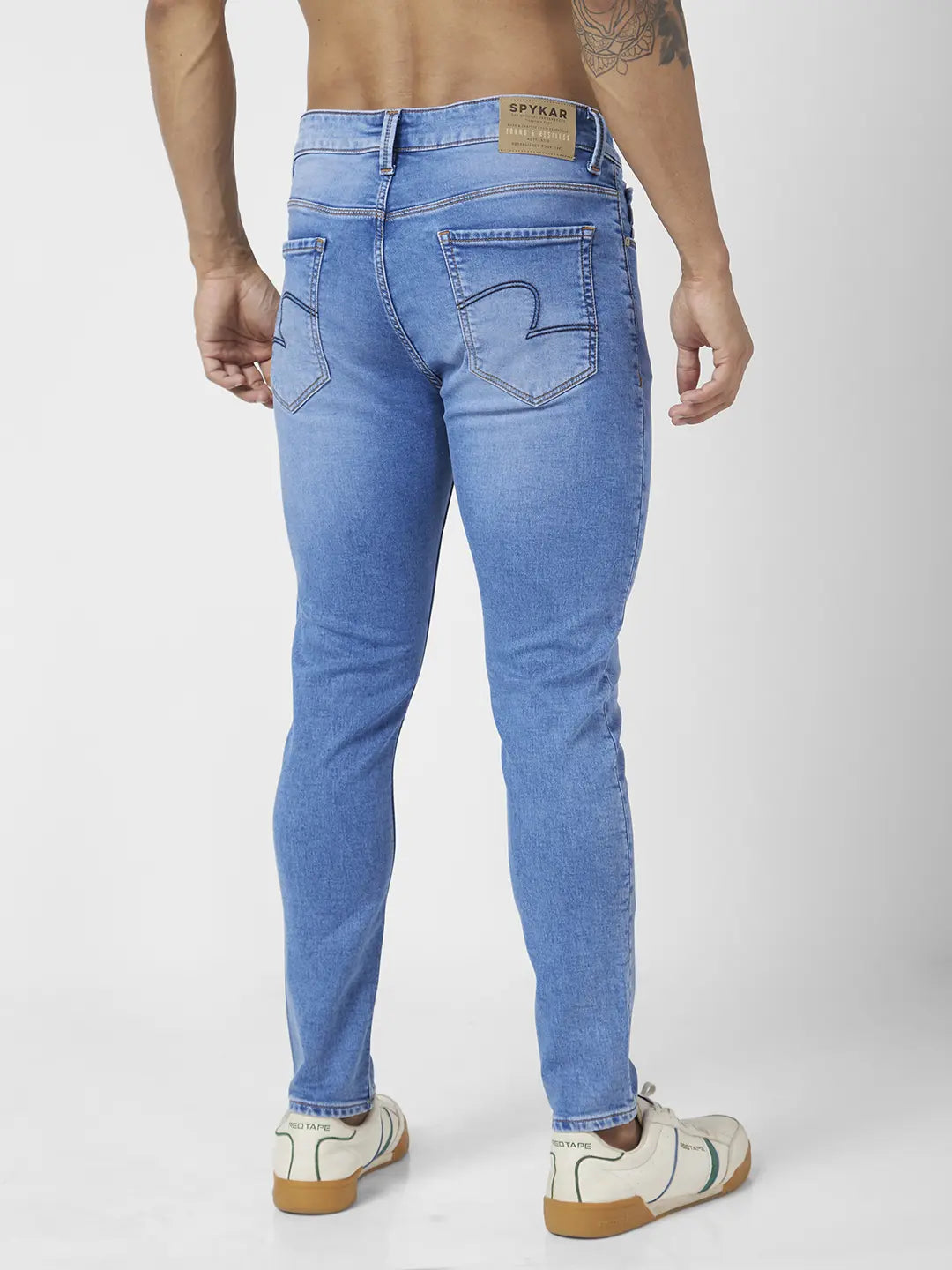 Spykar Men Light Blue Cotton Stretch Slim Fit Tapered Length Clean Look Mid Rise Jeans (Kano)